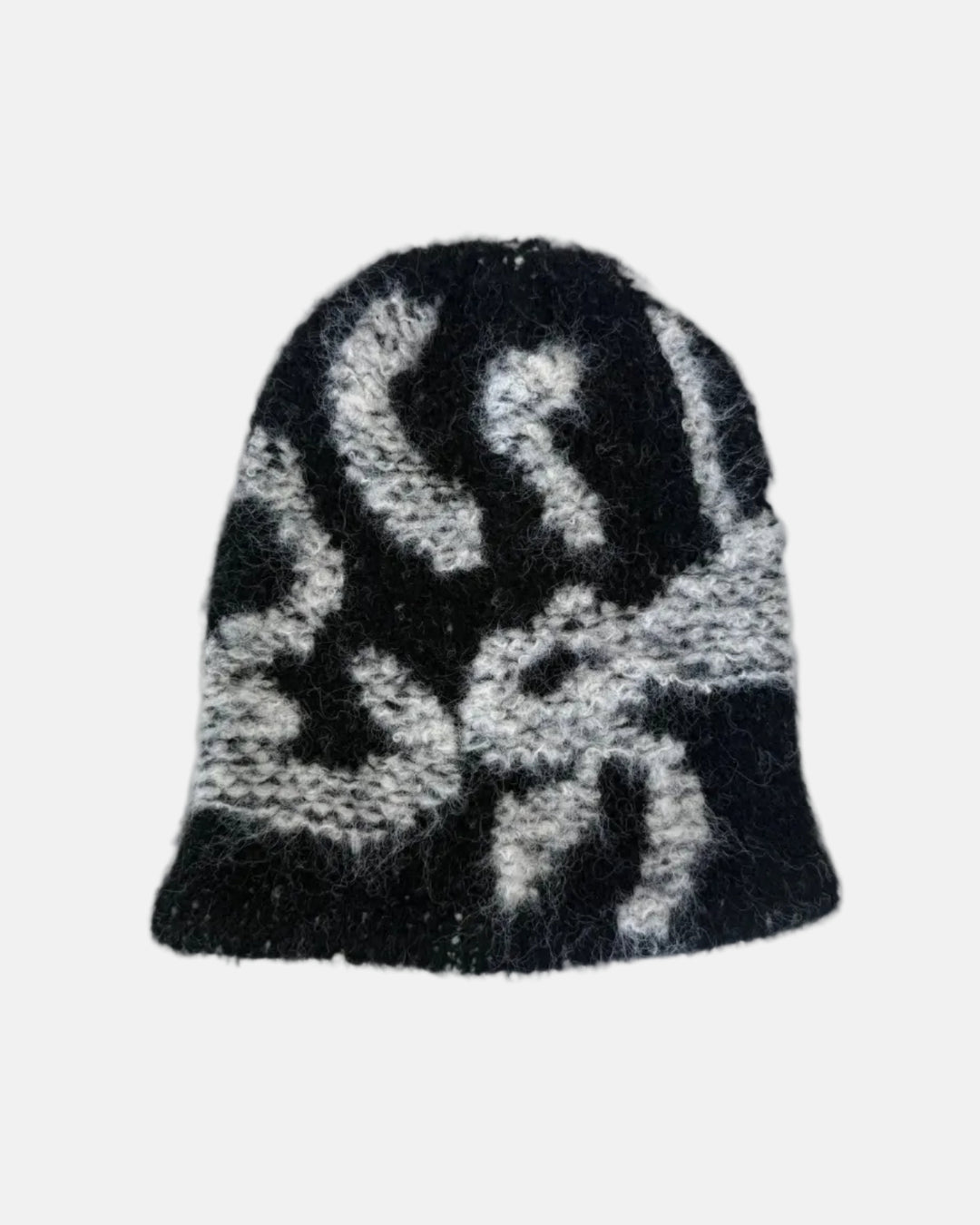 Rynor Abstract Knit Beanie – fuzzy black and white abstract pattern knit beanie, worn by a model