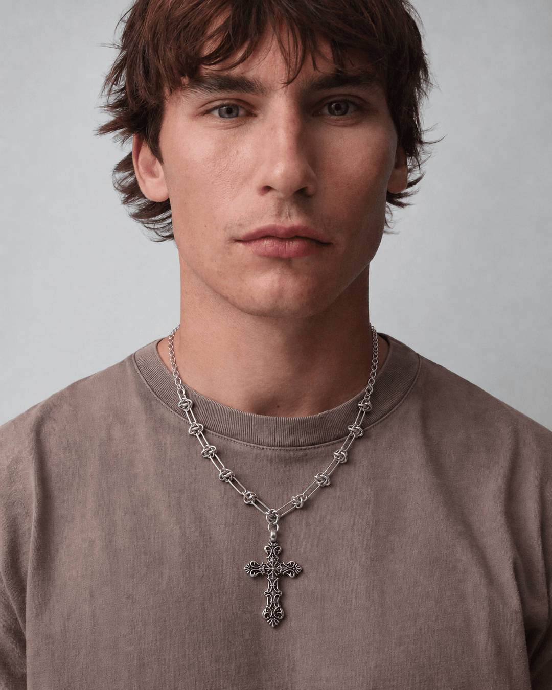 Rynor Bar Link Cross Necklace – silver bar link chain necklace with cross pendant, worn by a model