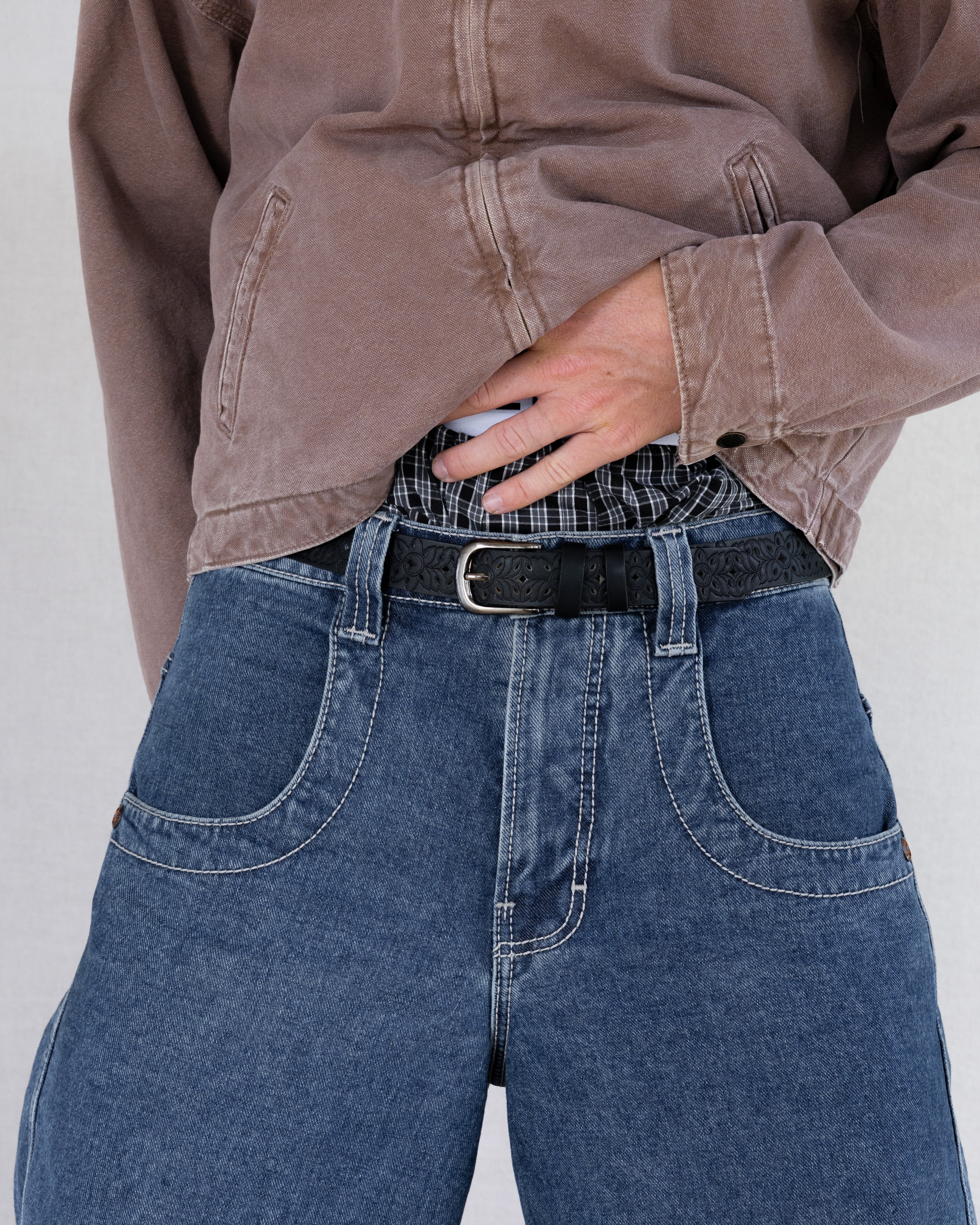 Rynor Carved Floral Belt – black belt with cutout-style tooling and metal buckle, additional view