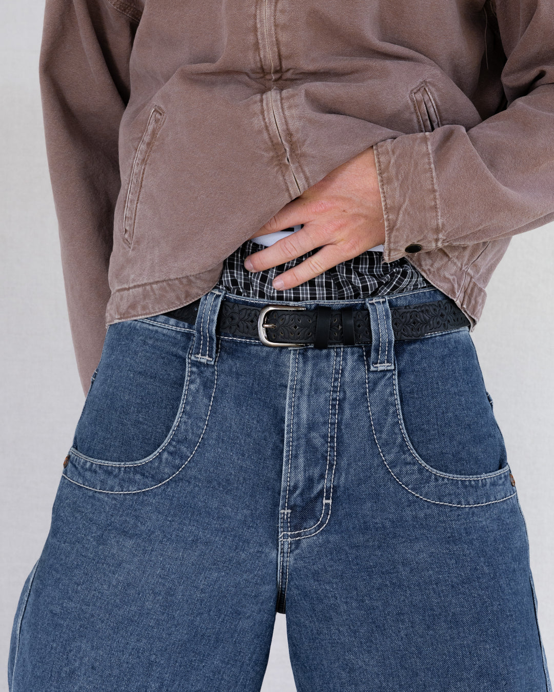 Rynor Carved Floral Belt – black belt with cutout-style tooling and metal buckle, additional view