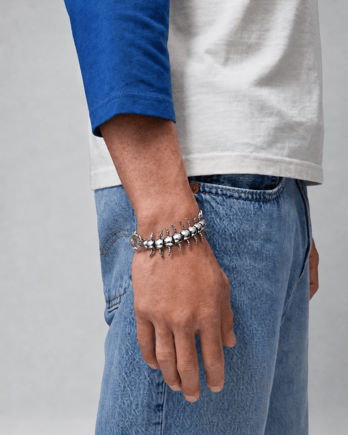 Rynor Centipede Chain Bracelet – silver stainless steel articulated centipede bracelet, worn by a model