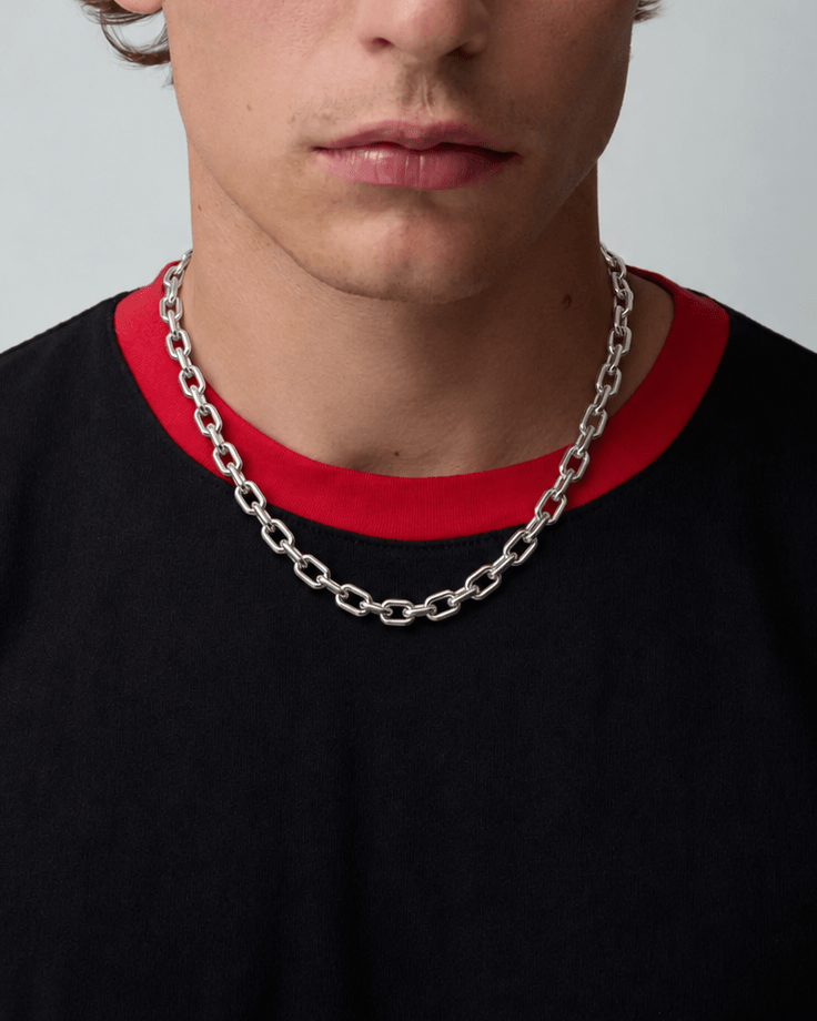 Rynor Chuck Link Chain – silver stainless steel oval link chain necklace, worn by a model