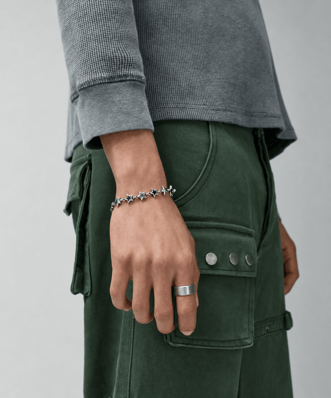 Rynor Core Band Ring – silver polished stainless steel plain band ring, worn by a model