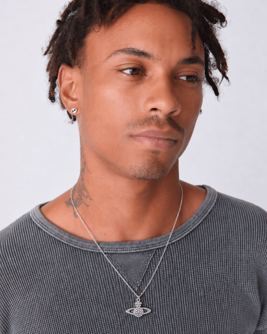 Rynor Crystal Starship Necklace – silver crystal-studded starship pendant necklace, worn by a model