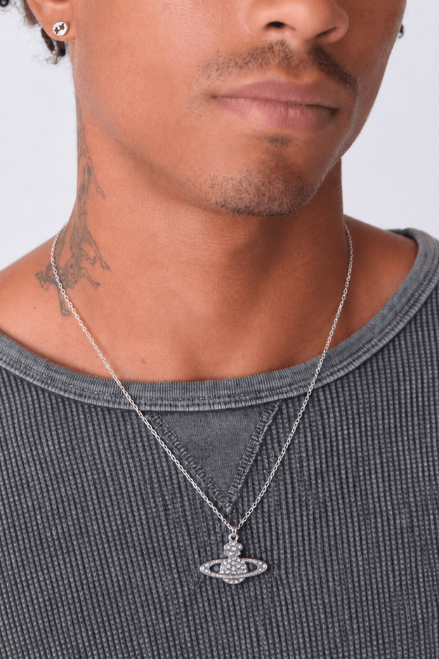 Rynor Crystal Starship Necklace – silver crystal-studded starship pendant necklace, worn by a model