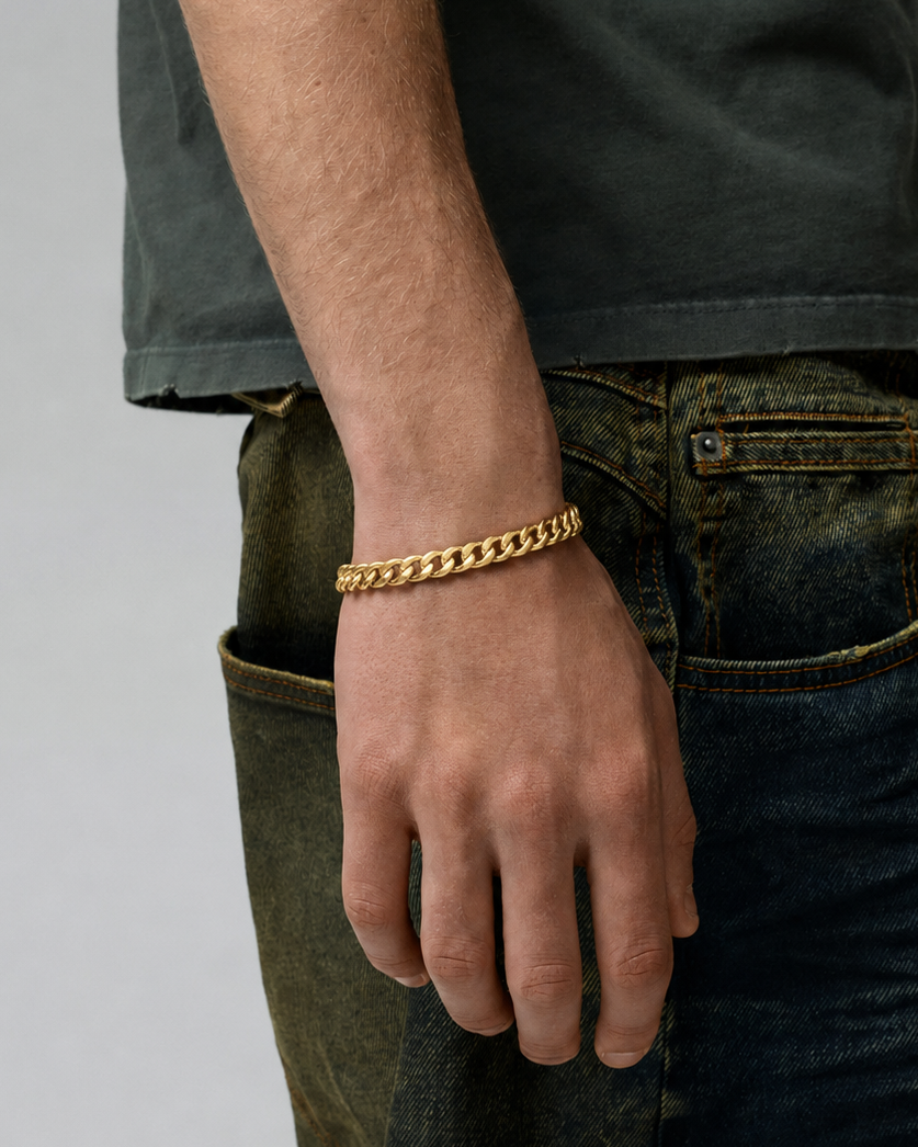 Rynor Curb Chain Bracelet – gold-tone stainless steel curb chain bracelet, worn by a model