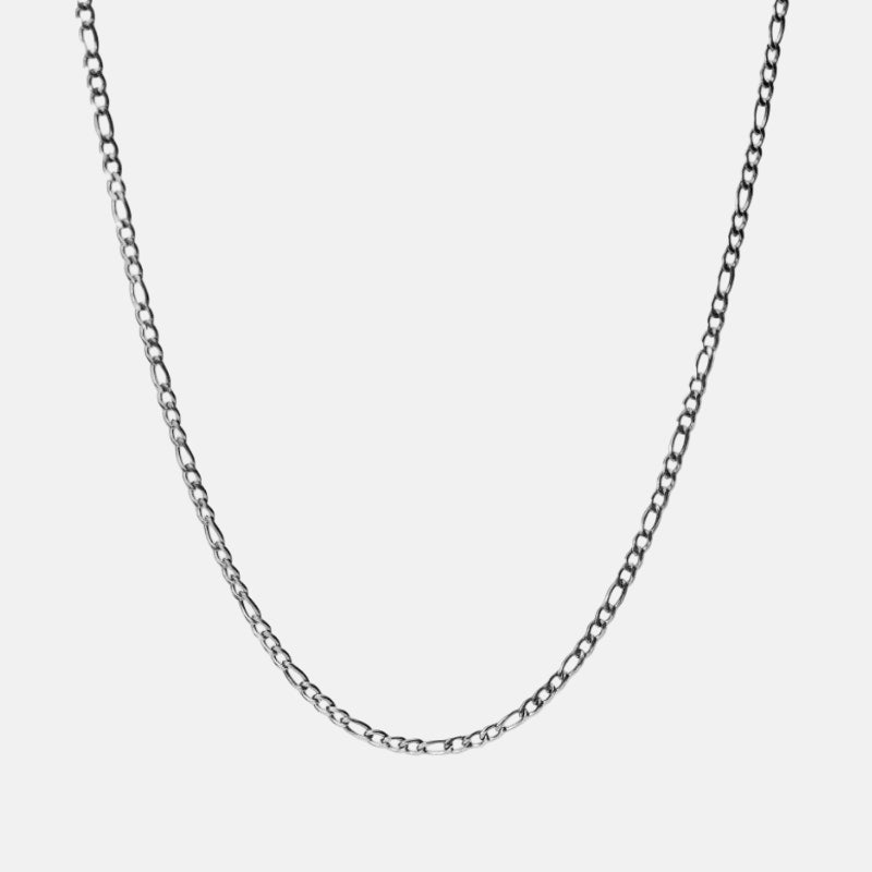 Rynor Figaro Chain – silver stainless steel figaro chain necklace, worn by a model