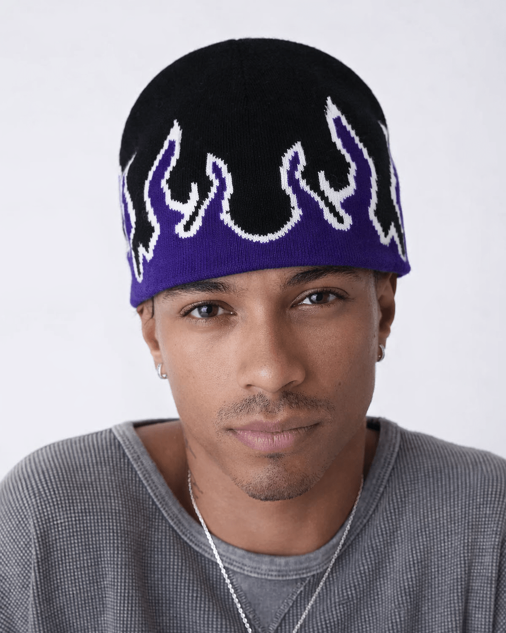 Rynor Flame Knit Beanie – purple and black flame pattern knit beanie, worn by a model