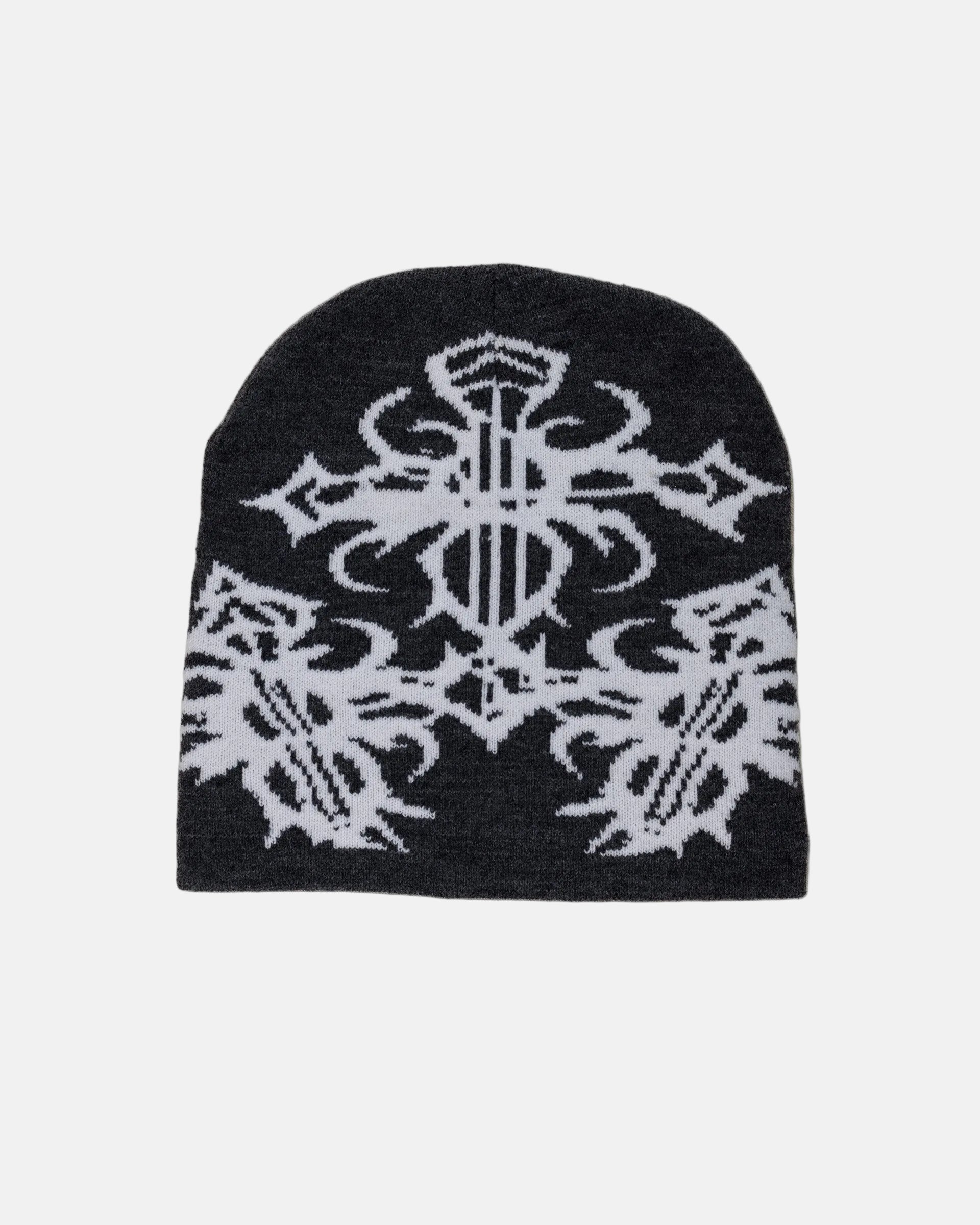 Rynor Gothic Cross Beanie – dark gray knit beanie with tribal cross graphic, product photo on white background
