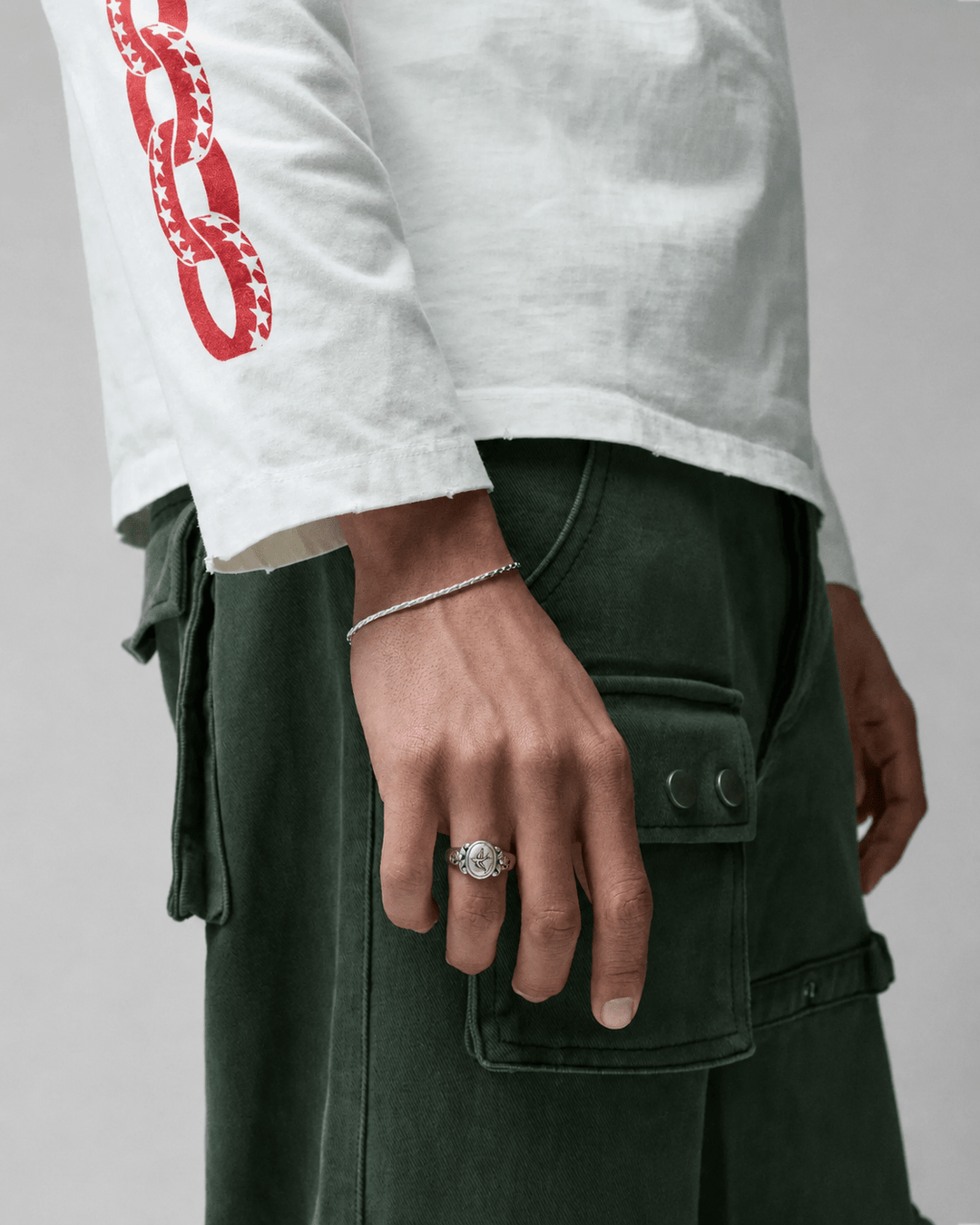 Rynor Gothic Dove Ring – 925 sterling silver ring with a dove wrapping the band, worn by a model