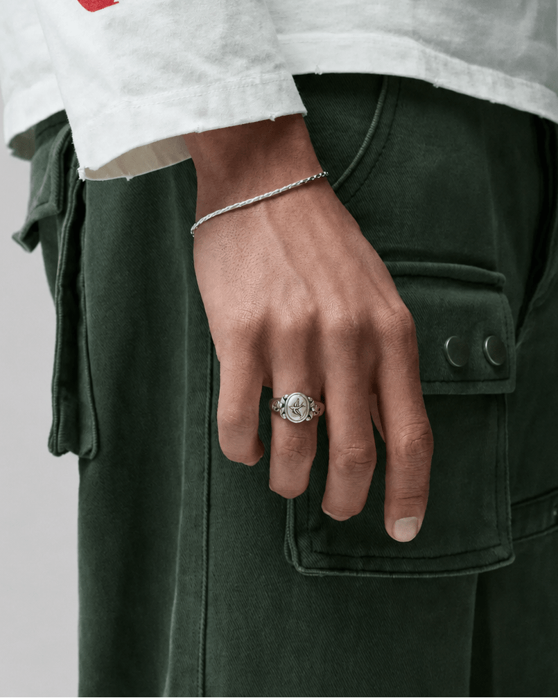 Rynor Gothic Dove Ring – 925 sterling silver ring with a dove wrapping the band, worn by a model