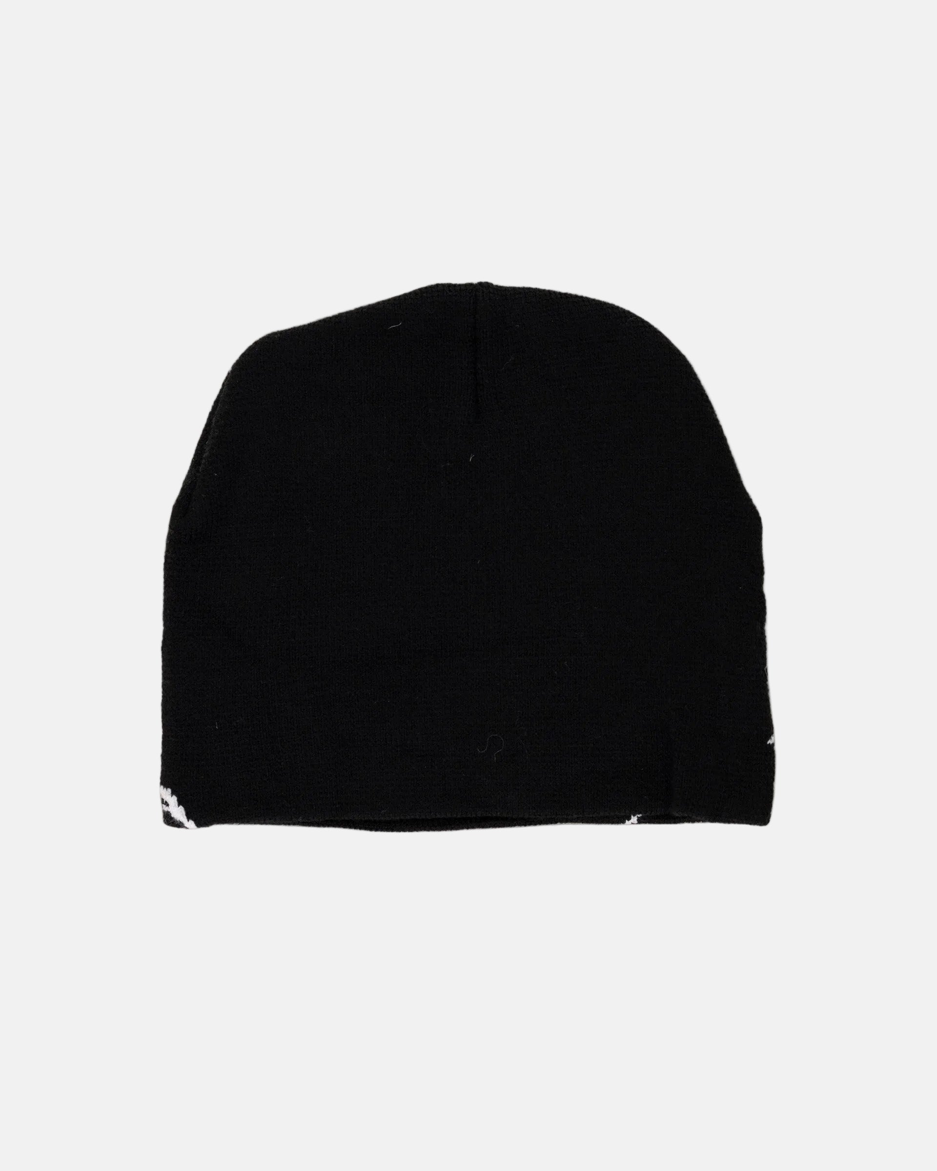 Rynor Spider Knit Beanie – black knit beanie with spider graphic, worn by a model