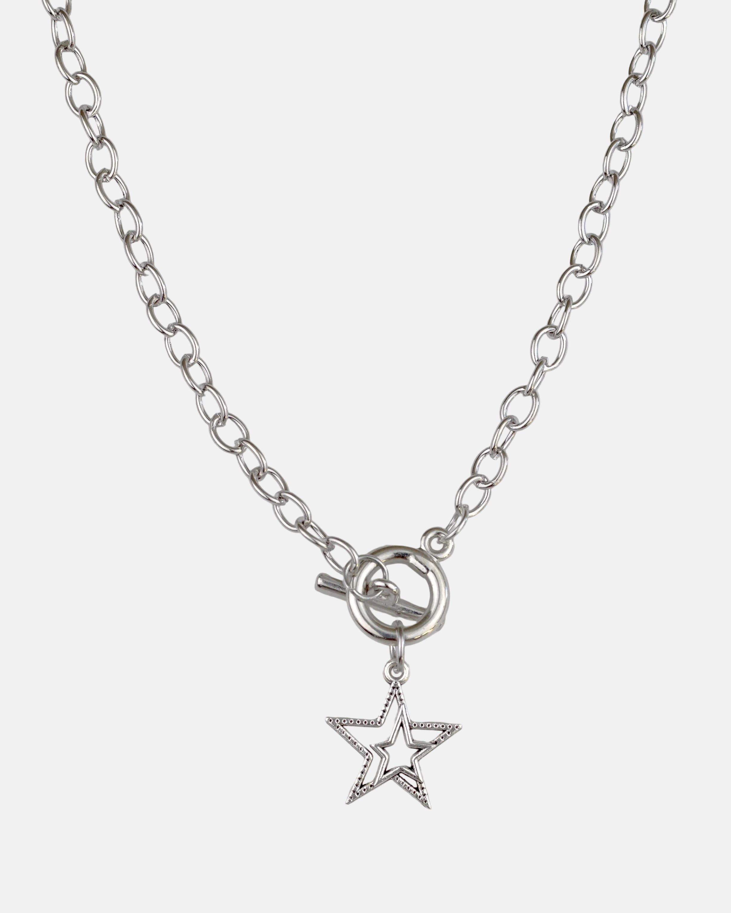 Rynor Star Toggle Necklace – silver toggle clasp chain necklace with star charm, product photo on white background